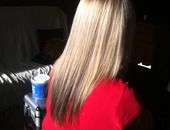 Coupe droite sur cheveux longs blonds